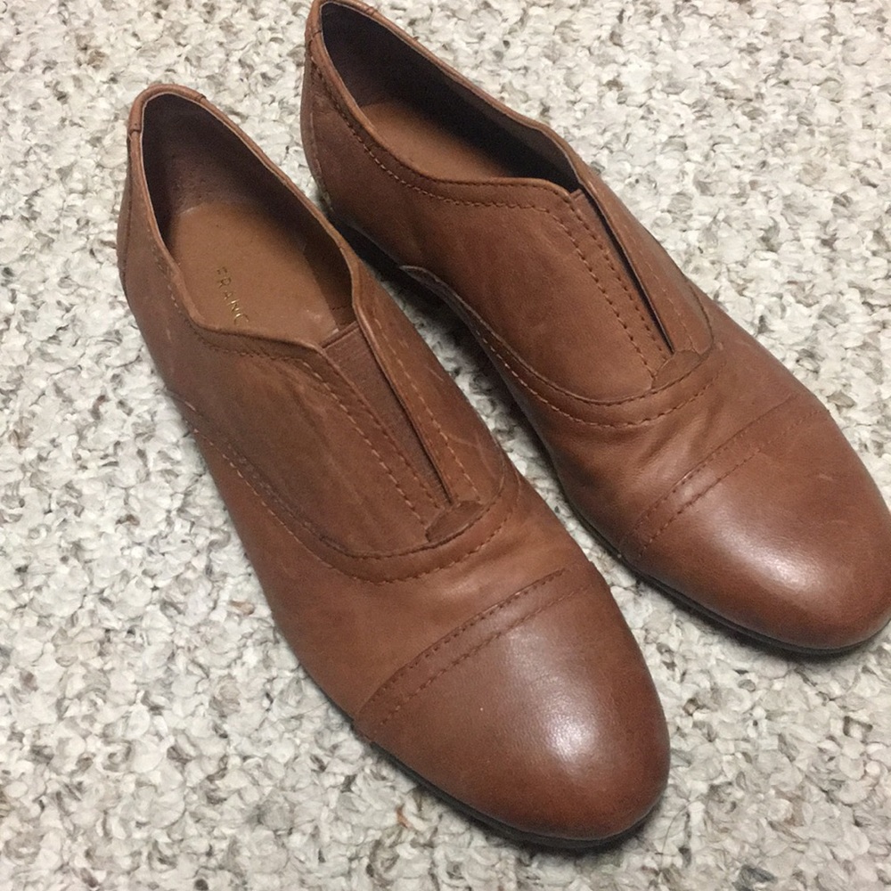Brown leather flats